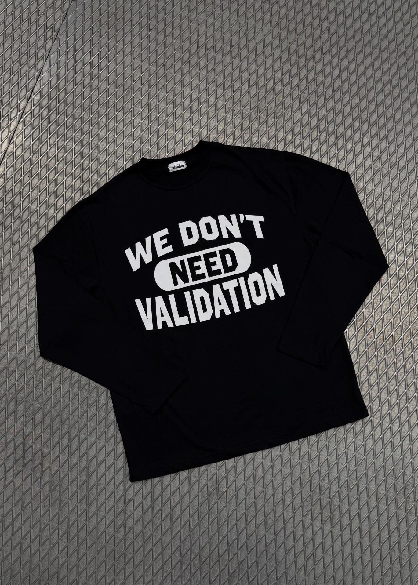 SLAMBBO LONGSLEEVE WHITE (WE DON'T NEED VALIDATION)